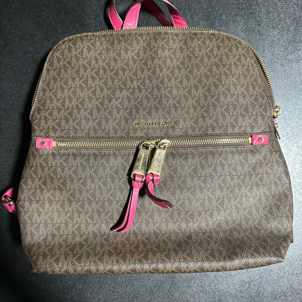 Michael Kors Dallas Medium Slim Signature Logo Backpack in Brown and Fuchsia